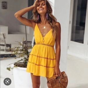 Yellow Hello Molly romper, size medium.